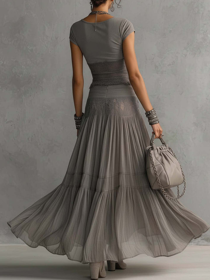 Ensemble haut en dentelle transparente et jupe longue plissée Gris