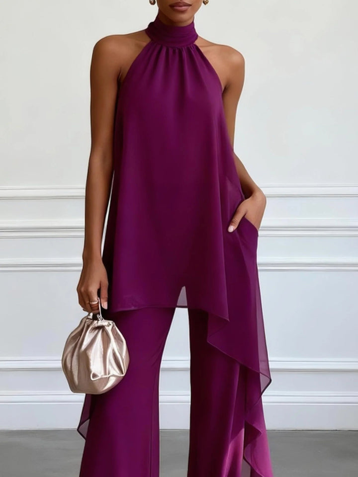 Ensemble deux pièces violet dos nu sans manches élégant composé d'un haut et d'un pantalon.