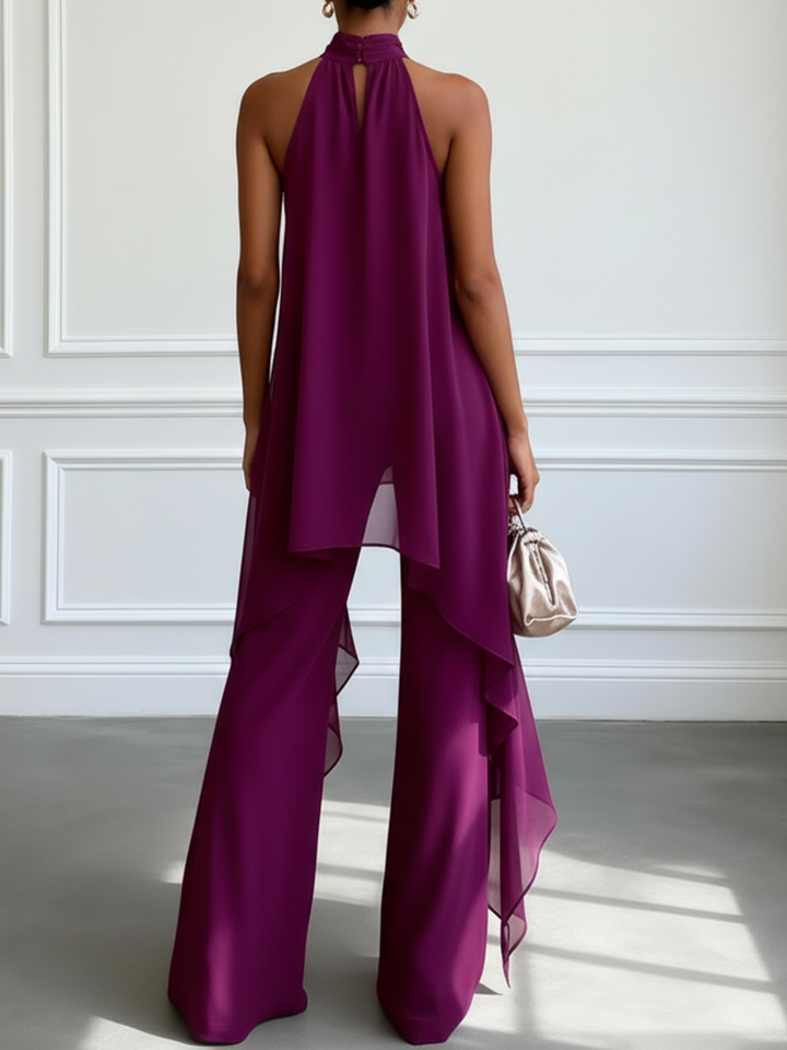 Ensemble deux pièces violet dos nu sans manches élégant composé d'un haut et d'un pantalon.