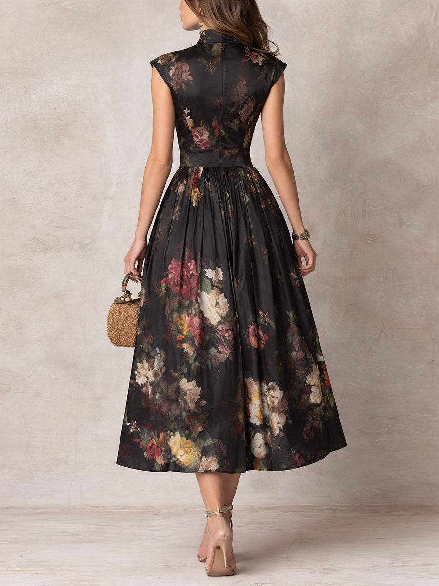 Robe midi plissée en satin à col trou de serrure et imprimé floral noir
