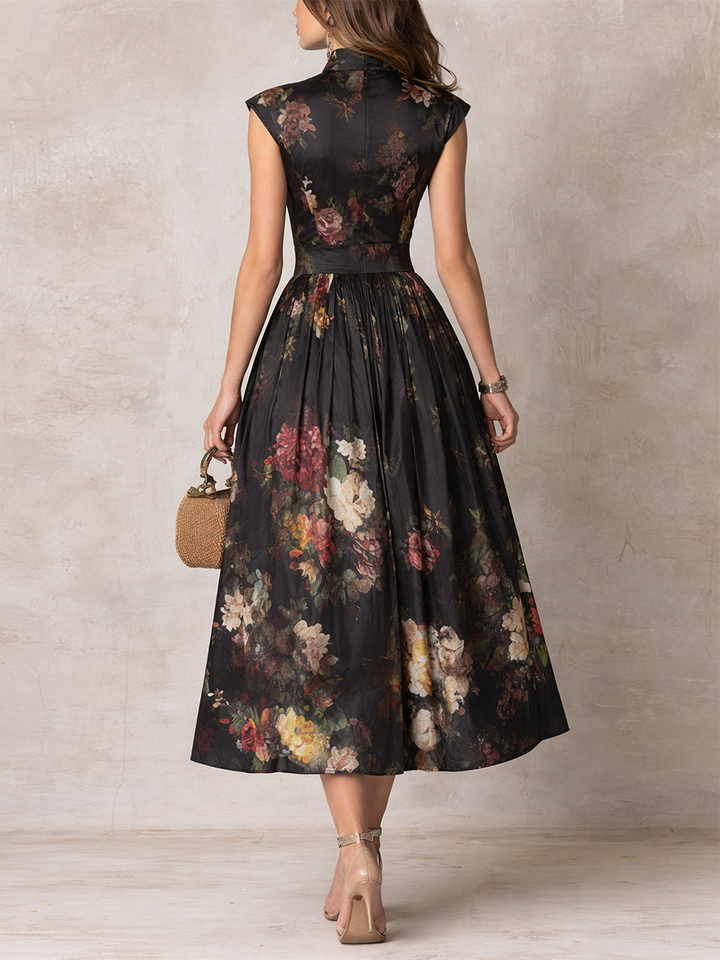 Robe midi plissée en satin à col trou de serrure et imprimé floral noir