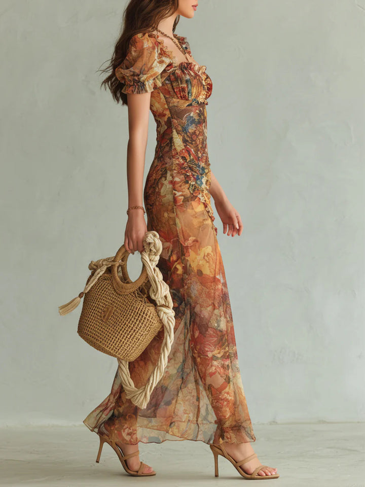 Robe longue en mousseline imprimée style bohème, idéale pour les vacances.